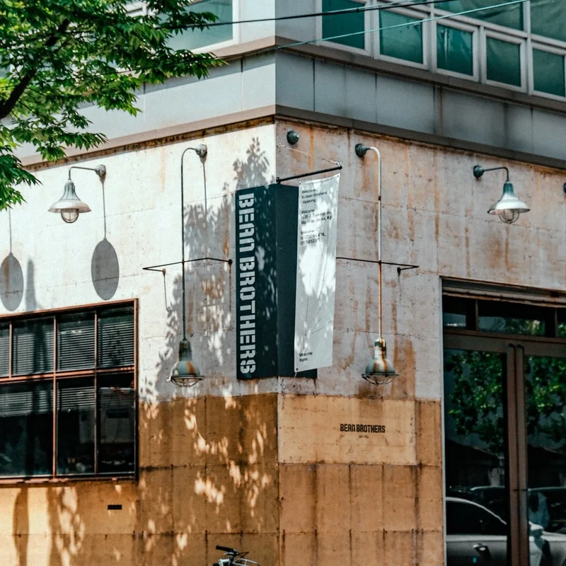 The Bean Brothers name appears across the exterior of its industrial Hapjeong café.