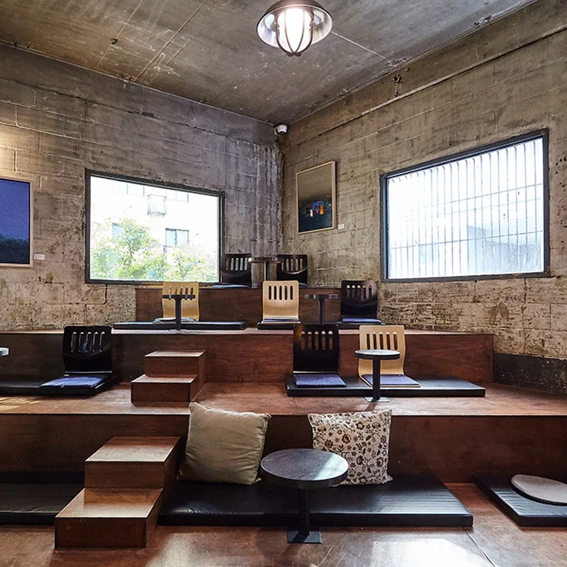 Large windows and timber seating in Bossa Nova Coffee Roasters Mullae
