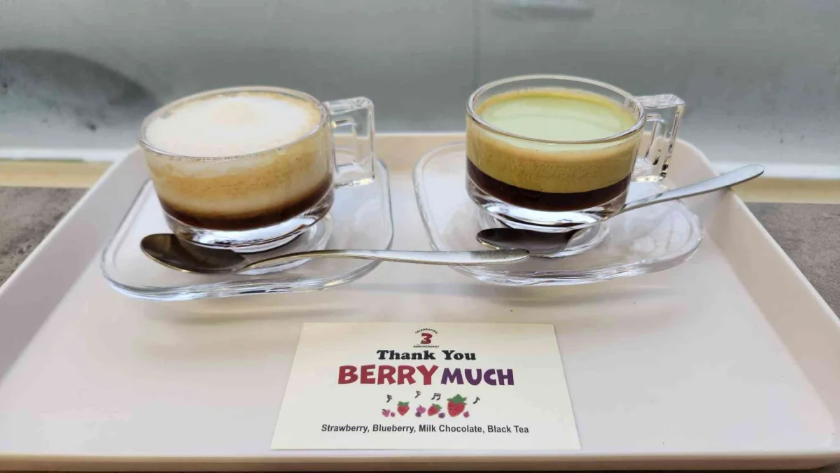 Two small coffees served with a seasonal blend card at Default Value Yeonhui.